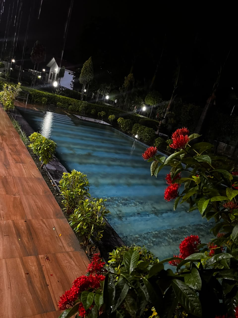 Swimming pool night view at Noida Party Farmhouse