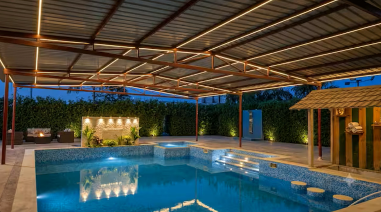 Covered private swimming pool at Shree Hans Farmhouse Sector 151 Noida