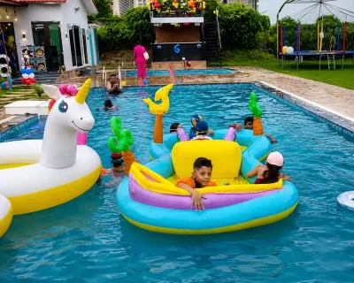 Pool Party at Vivaan Farms Noida Kids enjoying a pool party with colorful floats at Vivaan Farms Noida